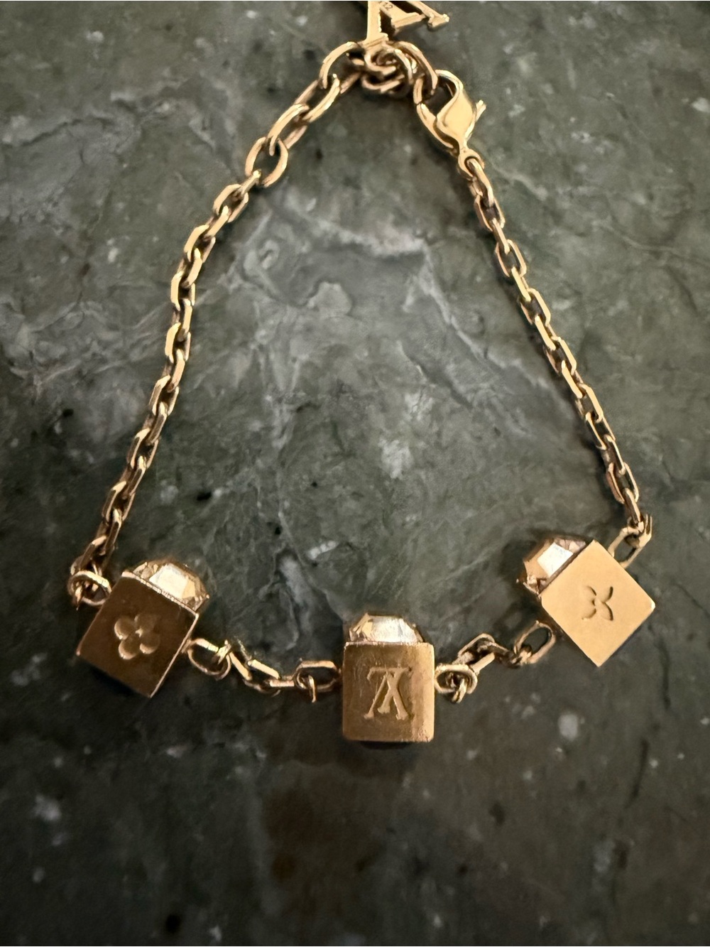 Louis Vuitton Gold-Tone Charm Cube Bracelet with Logo Details. Halloween sale 😊🎃